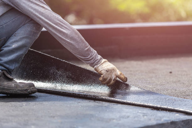 Professional Basement Waterproofing technician working in Friesland, WI